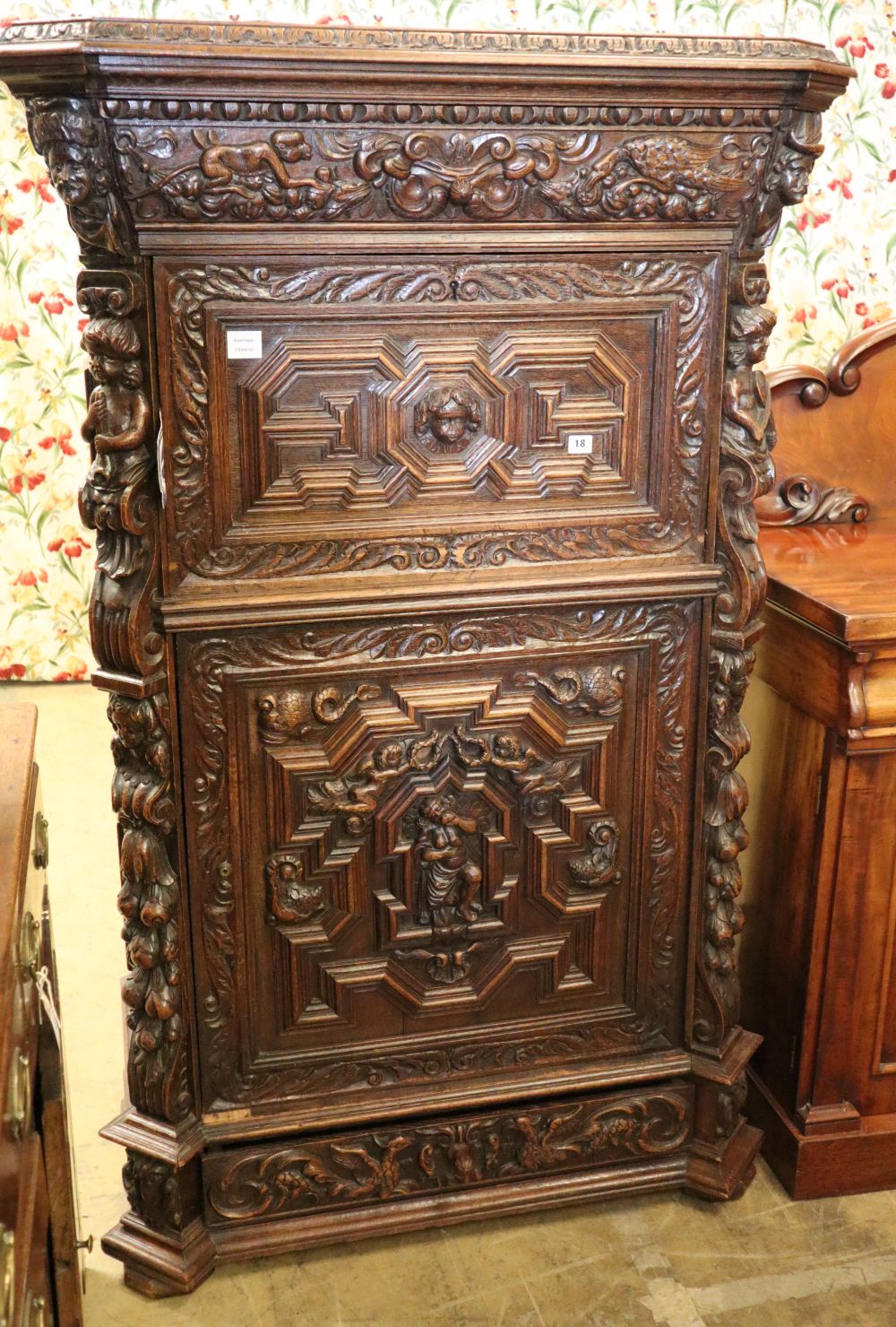 A late 19th century Flemish carved oak fall front secretaire cabinet, W.106cm, H.162cm